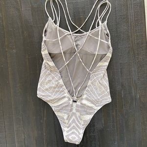 Gray and white Rip Curl one piece bathing suit